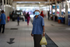  Brunei imposes curbs after first local COVID-19 cases in 15 months 