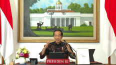 President Joko "Jokowi" Widodo speaks during a meeting on Aug. 7, 2021 to evaluate the results of the four-tier public activity restrictions (PPKM) policy.