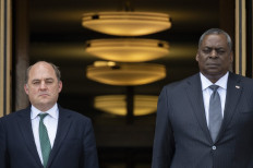 US Secretary of Defense Lloyd Austin(R) hosts an honor cordon for British Secretary of State for Defense Ben Wallace at the Pentagon in Washington, DC, on July 12, 2021. 