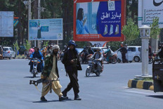 Taliban fighters patrol the streets in Herat, Afghanistan, on August 14, 2021.
