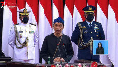 President Joko Widodo delivers the State of the Nation Address on Aug. 16, 2021 at the House of Representatives in Jakarta.
