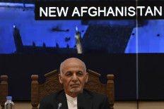 In this file photo taken on July 28, 2021, Afghanistan's President Ashraf Ghani looks on while attending a Joint Coordination and Monitoring Board meeting (JCMB) at the Afghan presidential palace in Kabul. Ghani said on August 15 after fleeing the country that the Taliban had won, as the militants entered Kabul -- nearly 20 years after they were ousted from power by a US-led invasion.