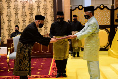 Malaysia's Cabinet inaugurated, self-quarantined PM misses ceremony