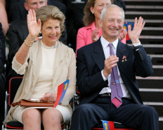 In this file photo taken on July 12, 2006 Mother and father of Crown Prince Alois, Marie of Liechtenstein (L) and Prince Hans-Adam II of Liechtenstein wave to the crowd during the parade in Vaduz for the small Alpine principality's 200th anniversary.