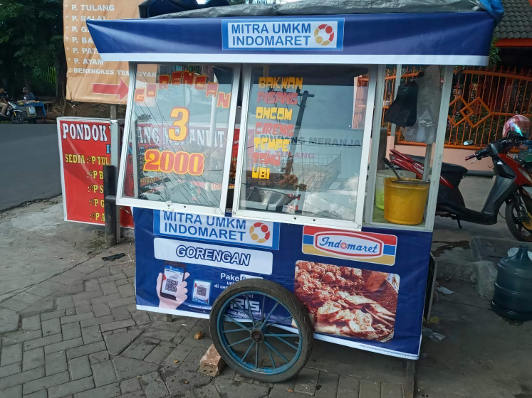 Fried delicacies: One of Imanuddin's carts for selling fritters, located in front of a minimarket,