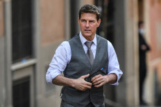 In this file photo taken on October 06, 2020, US actor Tom Cruise is pictured during the filming of 'Mission: Impossible 7' in Rome.