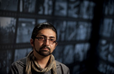 In this file photo taken on May 24, 2012 AFP photographer Massoud Hossaini speaks during a discussion of his Pulitzer Prize winning photograph at the Newseum in Washington.