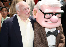 In this file photo actor Ed Asner and character Carl Fredricksen arrive for the premiere of Disney Pixar's 'Up' at the El Capitan Theatre in Hollywood on May 16, 2009. The prolific US character actor died on August 29, 2021.