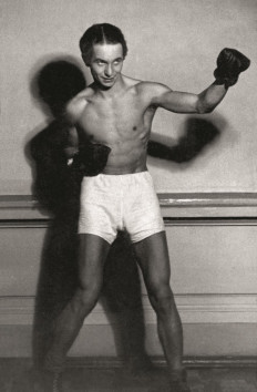 In this Handout picture taken in Warsaw before the World War II and released by Eleonora Szafran on August 26, 2021, Auschwitz boxer Tadeusz 'Teddy' Pietrzykowski poses in his sports' gear.