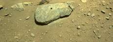 In this image released by NASA, taken on September 1, 2021, the drill hole from Perseverance’s second sample-collection attempt can be seen by one of the rover’s navigation cameras.