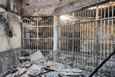  A burned-out cell at the Tangerang Class I Penitentiary in Banten is pictured on Wednesday, Sept. 8, 2021, following a fire that killed 49 inmates.