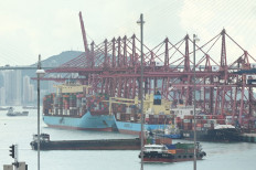 Container ships are seen docked at Kwai Chung container terminal in Hong Kong, China, on Sept. 14, 2021.