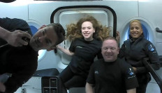 This September 16, 2021, image courtesy of Inspiration4 shows the Inspiration4 crew (L-R) Jared Isaacman, Hayley Arceneaux, Christopher Sembroski and Sian Proctor in orbit.