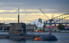 A Royal Australian Navy diesel and electric-powered Collins Class submarine sits in Sydney Harbor on Oct. 12, 2016. Australia awarded a French contractor the main contract to design and build its next generation of submarines in 2016 but reneged on the deal in favor of plans to acquire nuclear-powered submarines from the United States and Britain under the new AUKUS partnership.