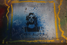 Graffiti seen under a bridge in Kurt Cobain Park in Aberdeen, Washington on April 1, 2014. The park and bridge where Cobain used to hang out and write songs has become a symbol for fans as it was a gathering place after the news of his death spread.
