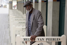 In this file photo taken on September 5, 2012 US director Melvin Van Peebles poses during a photocall at the 38th US Film Festival, in the French northwestern sea resort of Deauville.