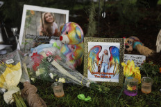  A makeshift memorial dedicated to Gabby Petito is located near the North Port City Hall on September 21, 2021 in North Port, Florida. The body of Petito was found by authorities in Wyoming, where she went missing while on a cross-country trip with her fiancé, Brian Laundrie. Law enforcement agencies are for searching for his whereabouts.
