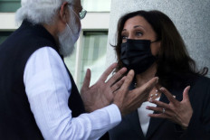 US Vice President Kamala Harris (right) and Indian Prime Minister Narendra Modi tour the balcony outside the Vice President’s ceremonial office at Eisenhower Executive Office Building during a meeting on September 23, 2021 in Washington, DC. Modi is on a visit in Washington and will participate in the first in-person Quad Summit with his counterparts from the U.S., Australia and Japan at the White House tomorrow. 