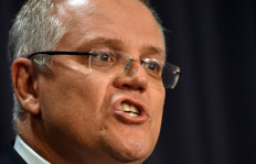  In this file photo taken on August 24, 2018 Australia's incoming Prime Minister Scott Morrison speaks at a press conference in Canberra. Former Australian leader Malcolm Turnbull said on September 29, 2021 his successor 