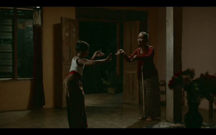 LGBT classic: A young Juno (Raditya Evandra, left) explores his identity through his lifelong passion for Lengger dance in Garin Nugroho's highly acclaimed 'Kucumbu Tubuh Indahku' ('Memories of My Body', 2019), which swept 11 Indonesian and international awards.(Courtesy of Fourcolours Films)