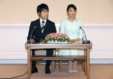 This file picture taken on September 3, 2017 shows Japan's Princess Mako, the eldest daughter of Prince Akishino and Princess Kiko, and her fiancee Kei Komuro at a press conference to announce their engagement at the Akasaka East Residence in Tokyo.