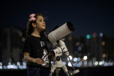 Head in the sky: 8-year-old Brazilian girl dubbed world's youngest astronomer