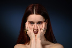 British fashion influencer Daniella Loftus poses during a photo session in Paris on October 1, 2021.