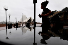 Sydney to end COVID-19 quarantine for international travellers