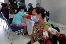 Govt to start giving booster shots to public next week as Omicron threat looms