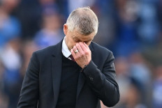 Manchester United's Norwegian manager Ole Gunnar Solskjaer reacts at the end of the English Premier League football match between Leicester City and Manchester United at King Power Stadium in Leicester, central England on October 16, 2021.
