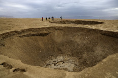 Sinkholes on receding Dead Sea shore mark 'nature's revenge' 