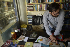 This picture taken on October 23, 2021 shows Abdul Amin Hossaini, a middle-aged bookseller, talking during an interview with AFP in Kabul.