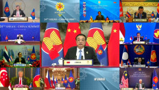 This handout photo released by the host broadcast, ASEAN Summit 2021, on Oct. 26, 2021 shows Chinese Premier Li Keqiang (center) taking part in the ASEAN-China Summit on the sidelines of the 2021 Association of Southeast Asian Nations (ASEAN) summits held online on a live video conference in Bandar Seri Begawan, Brunei. 