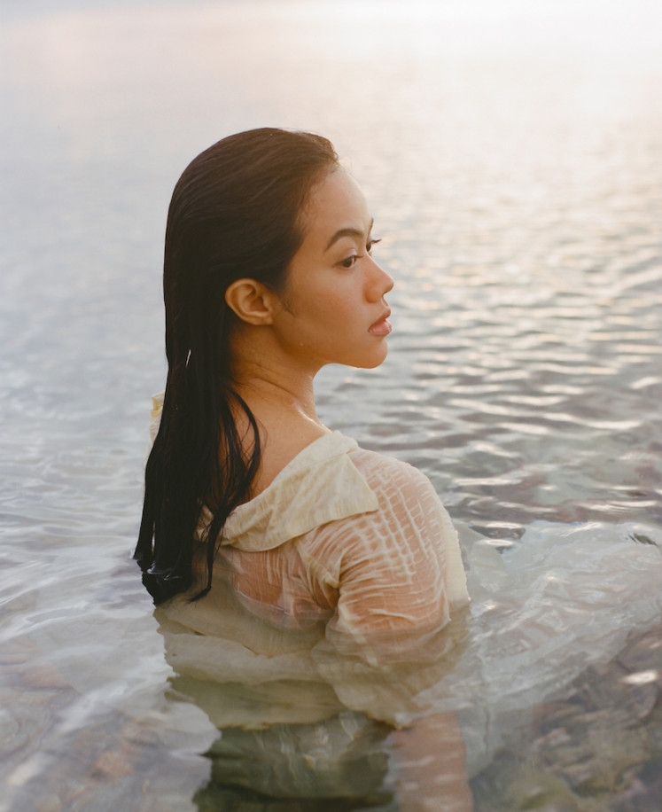 Something in the water: For the tone and visuals of Tutur Batin, Yura Yunita puts 'water' at its center, symbolizing 'tears, ablution water, and rain'. (Courtesy of Merakit)