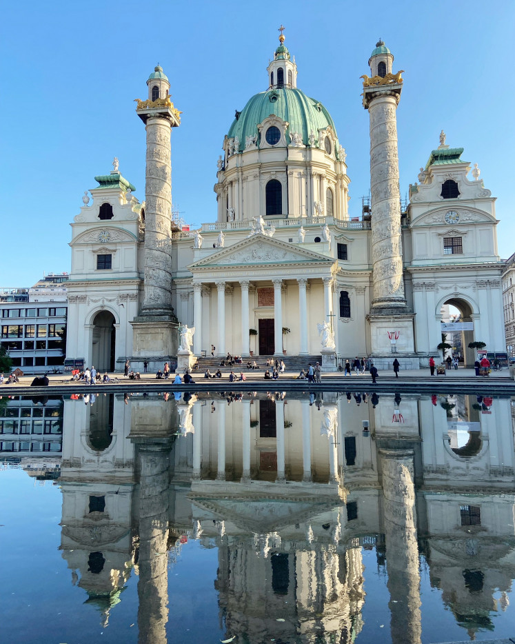 Reflective: St. Charles Church, a baroque church built in the first half of the 18th century.