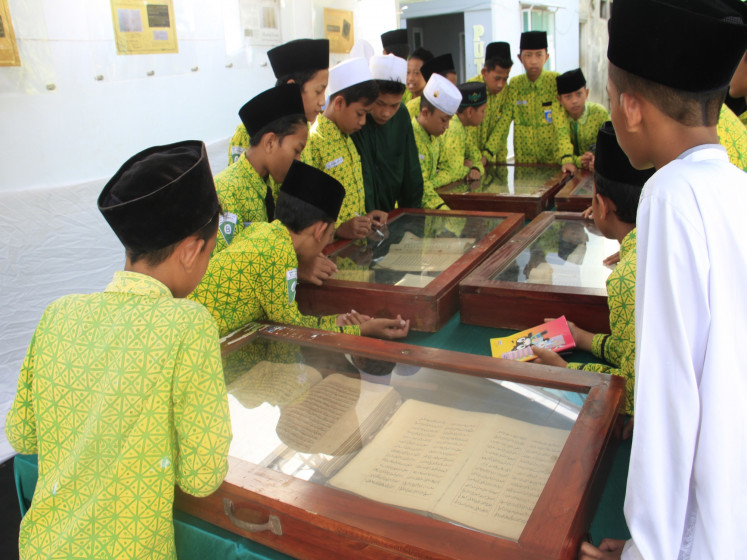 Select few: Due to the dwindling rate of pesantren enrolment, many fear that Pegon reader and the knowledge will extinct. (Courtesy Pegon Community)