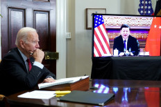 US President Joe Biden meets with China's President Xi Jinping during a virtual summit from the Roosevelt Room of the White House in Washington, DC, November 15, 2021. 