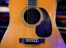 Eric Clapton's 1968 Martin D-45 acoustic guitar is on display during a press preview November 15, 2021 in New York to promote Julien's Auctions Icons & Idols: Rock N Roll auction that will take place November 19th and 20th.
