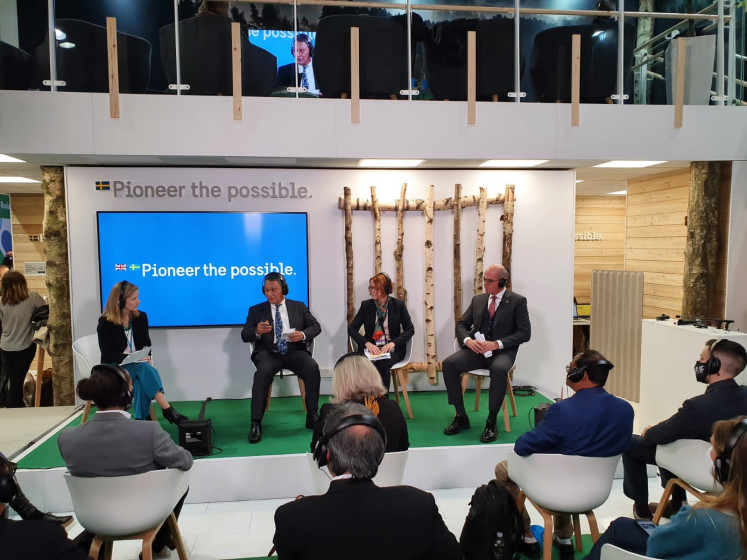 Moderated by the World Economic Forum, Hitachi Energy CEO Claudio Facchin participates in a renewable energy discussion panel with Indonesian Energy and Mineral Resources Minister Arifin Tasrif during the recent COP 26 Climate Summit in Glasgow, the United Kingdom. 
