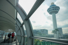 Singapore to waive quarantine for vaccinated travelers from April