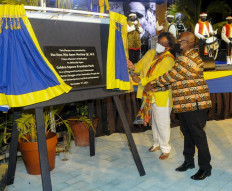 Barbados Prime Minister Mia Amor Mottley (2R) and Member of Parliament Trevor Prescott (R) unveil the plaque at the official opening of Golden Square Freedom Park in Bridgetown, Barbados on November 27, 2021. Barbados is about to cut ties with the British monarchy, but the legacy of a sometimes brutal colonial past and the pandemic's impact on tourism pose major challenges for the Caribbean island as it becomes the world's newest republic.