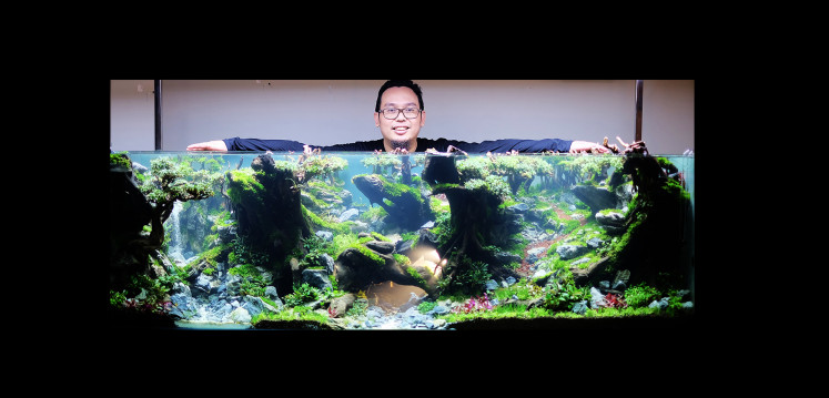 Proud owner: A portrait of Riswandi, owner and founder of Aquair.id with his creation. (Courtesy of Riswandi)