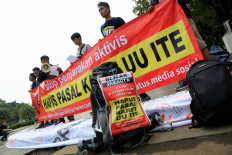 Defamation case proceeds against two rights activists despite calls for reform