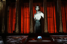 An image of Josephine Baker is projected during a ceremony dedicated to Josephine Baker, the American-born French dancer and singer who fought in the French Resistance and later battled racism, at the French Pantheon in Paris on November 30, 2021. The icon of the Roaring Twenties, born in 1906 in the United States before adopting French nationality, is only the sixth woman out of 80 illustrious figures to receive the honor of being welcomed into the Pantheon, a grandiose neoclassical building in the heart of Paris, whose pediment proclaims "To the great men, the grateful fatherland.
