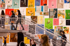 Visitors at the opening of GES-2 contemporary arts center by the banks of Moksva River in Moscow on Dec. 3. 