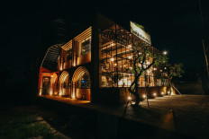 Visual treat: The three-story Santanera restaurant looks like a glasshouse from the outside. (Courtesy of Santanera)
