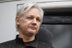 In this file photo taken on May 19, 2017, Wikileaks founder Julian Assange speaks on the balcony of the Embassy of Ecuador in London.