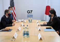 United States Secretary of State Antony Blinken (left) and Japan's Foreign Minister Yoshimasa Hayashi (right) hold a bilateral meeting on the margins of the Group of Seven ministerial meeting in Liverpool, north-west England, on Dec. 11. The two-day gathering of foreign and development ministers from the group of wealthy countries comes amid rising global tensions.