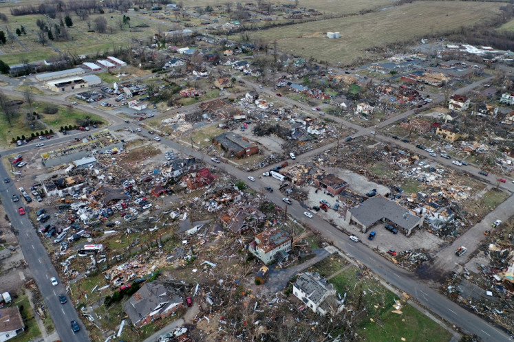  An aerial view of homes and business destroyed by a tornado on December 11, 2021 in Mayfield, Kentucky. Multiple tornadoes touched down in several midwestern states late Friday evening causing widespread destruction and leaving an estimated 70-plus people dead. 