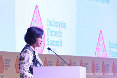 Finance Minister Sri Mulyani Indrawati delivers a speech during the 2021 Indonesia Fintech Summit in Bali on Saturday.